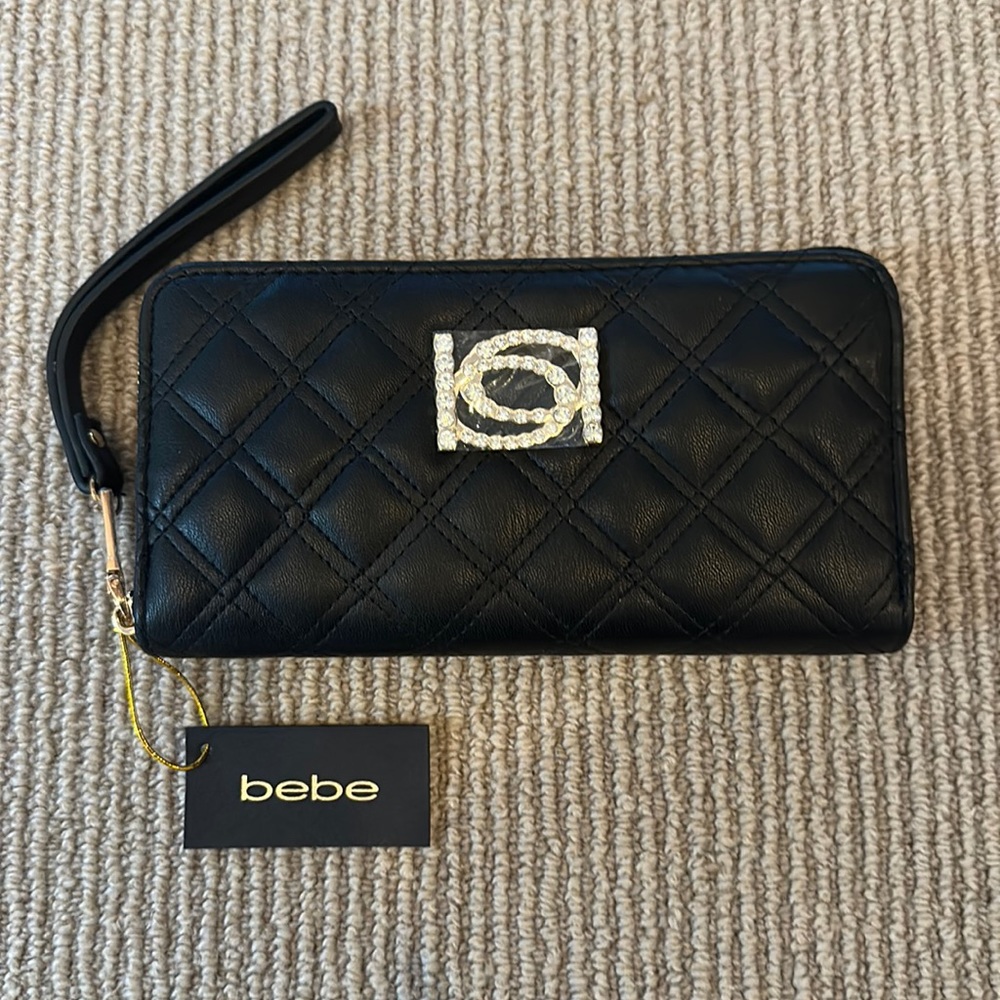 bebe wristlet in black with rhinestone detail